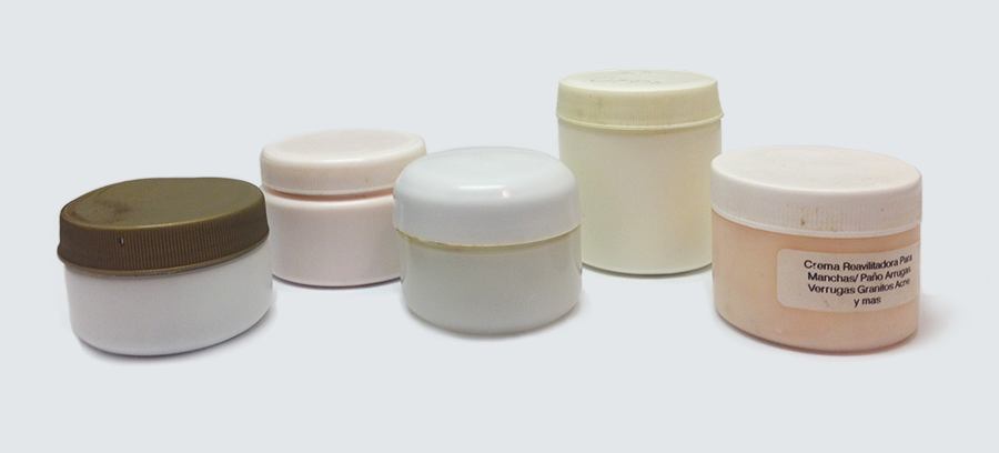 Five plastic jars of different sizes and shapes