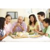 A mulit-generational family of Asian-Americans sharing a meal